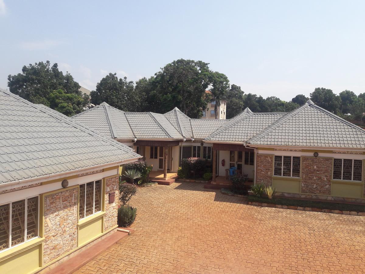 Prestige Resort Cottages Энтеббе Экстерьер фото
